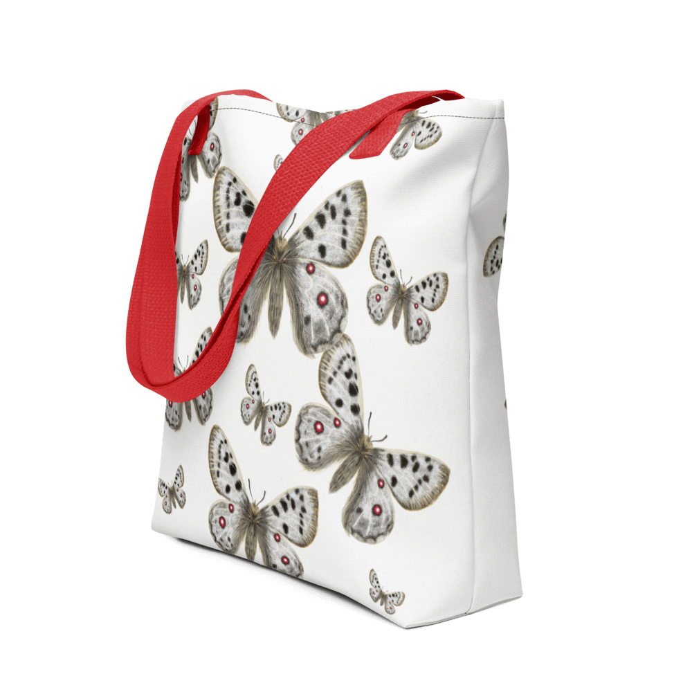 Apollo all-over print tote bag with red handles displayed prominently
