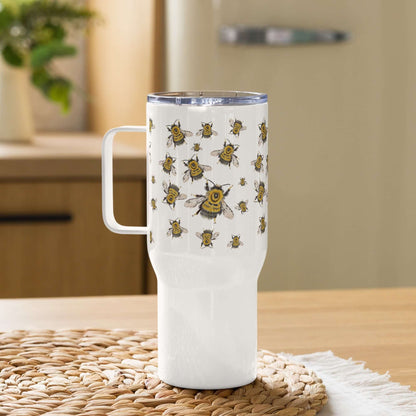 Bumblebee design insulated tumbler on a kitchen table, perfect for travel and coffee on-the-go.