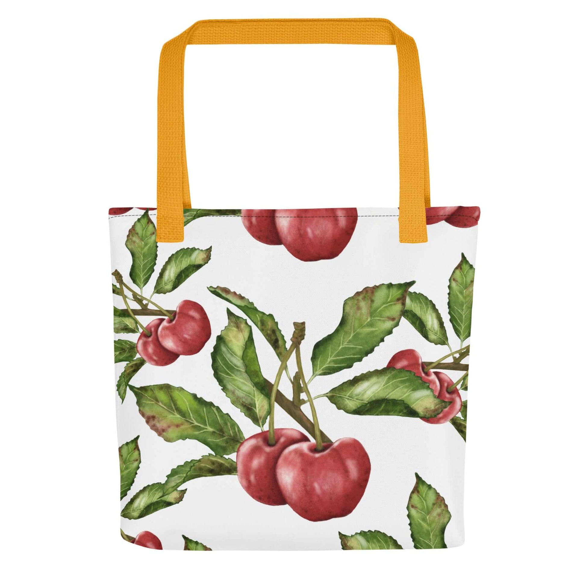 Floral canvas tote bag featuring vibrant cherry design and yellow handles, perfect as a gift for her or a stylish beach bag.