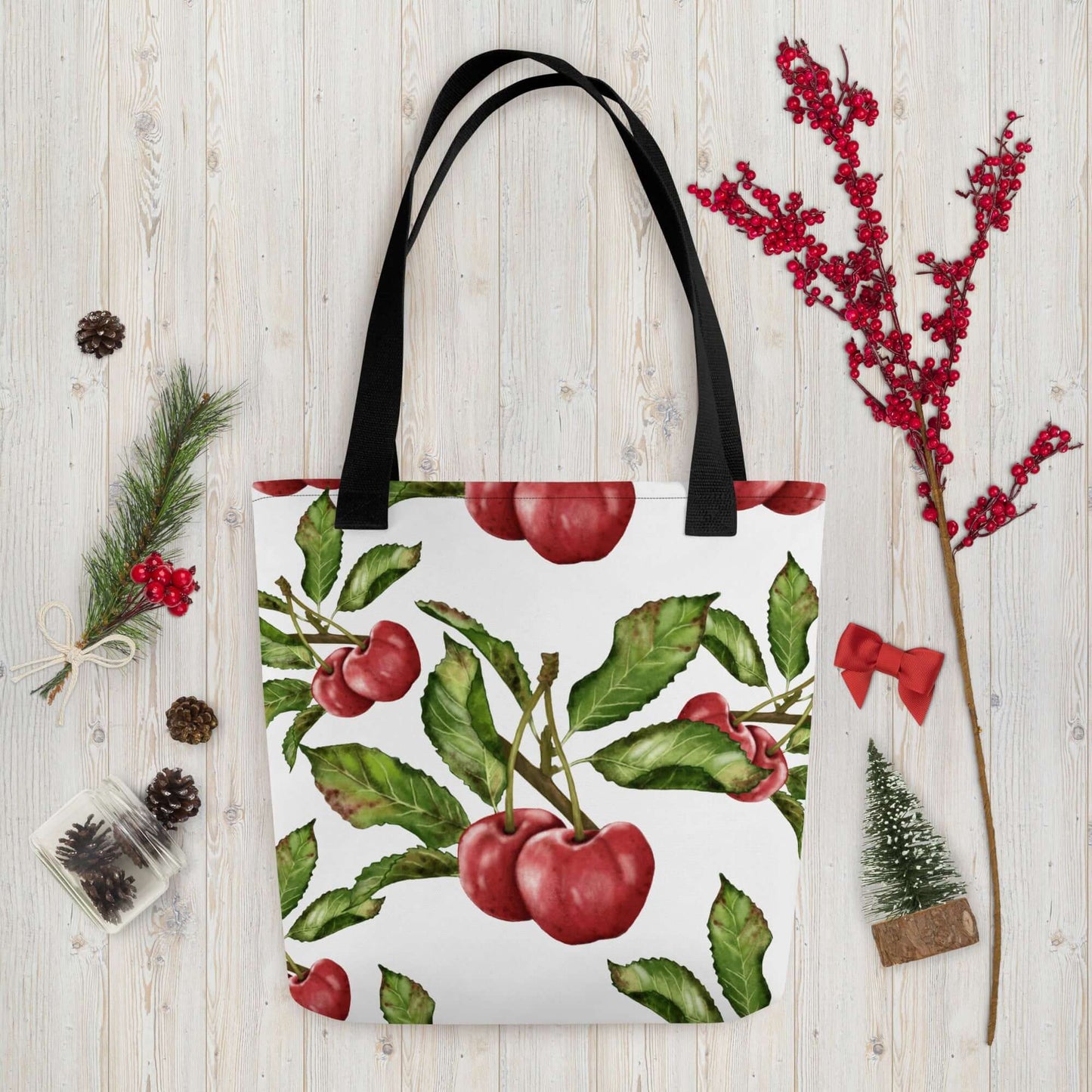 Floral canvas tote bag featuring vibrant cherry designs, perfect for gifts and everyday use. Ideal for home decor and seasonal styling.