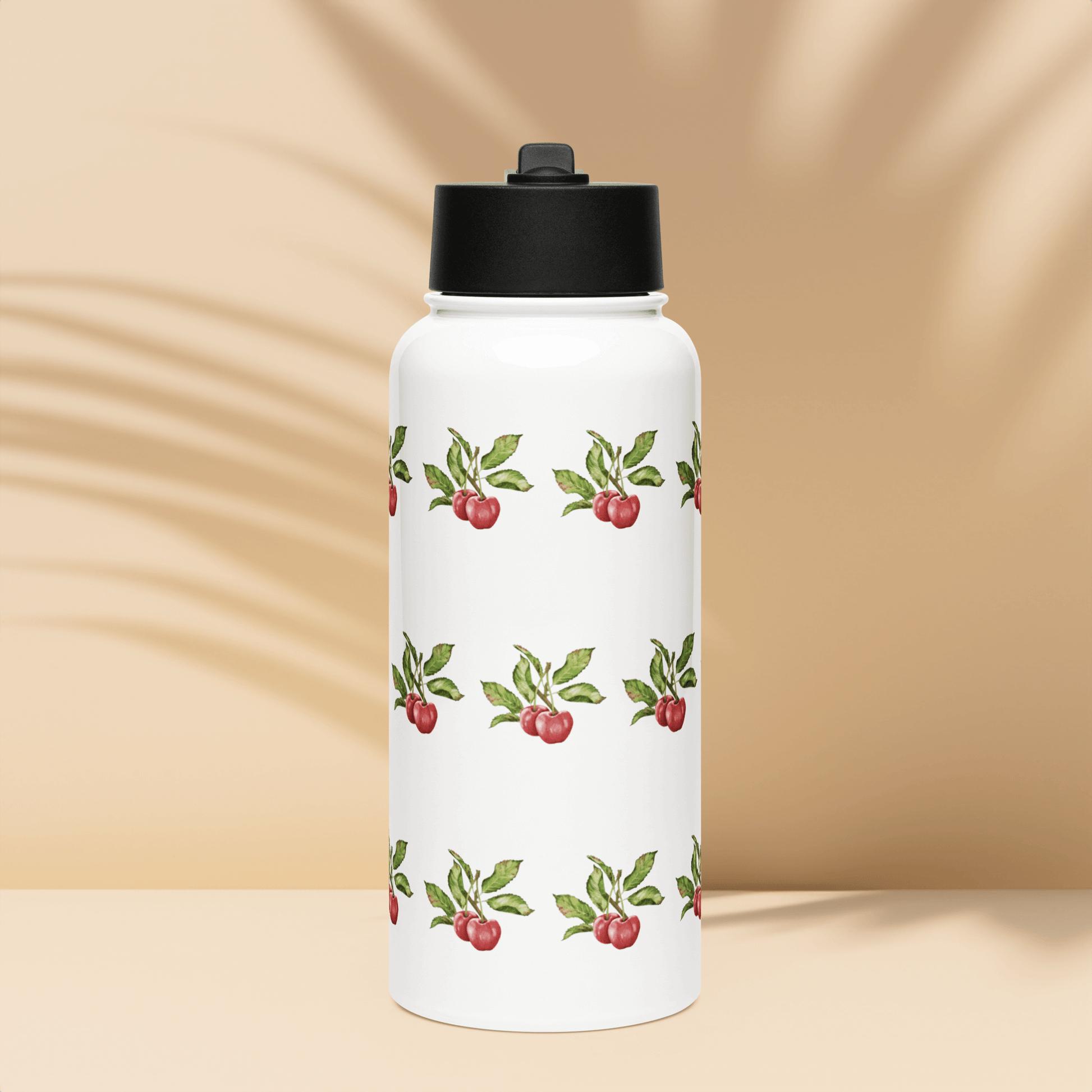 Bright cherry-patterned insulated tumbler on a neutral background, perfect for vibrant hydration and stylish gifting.