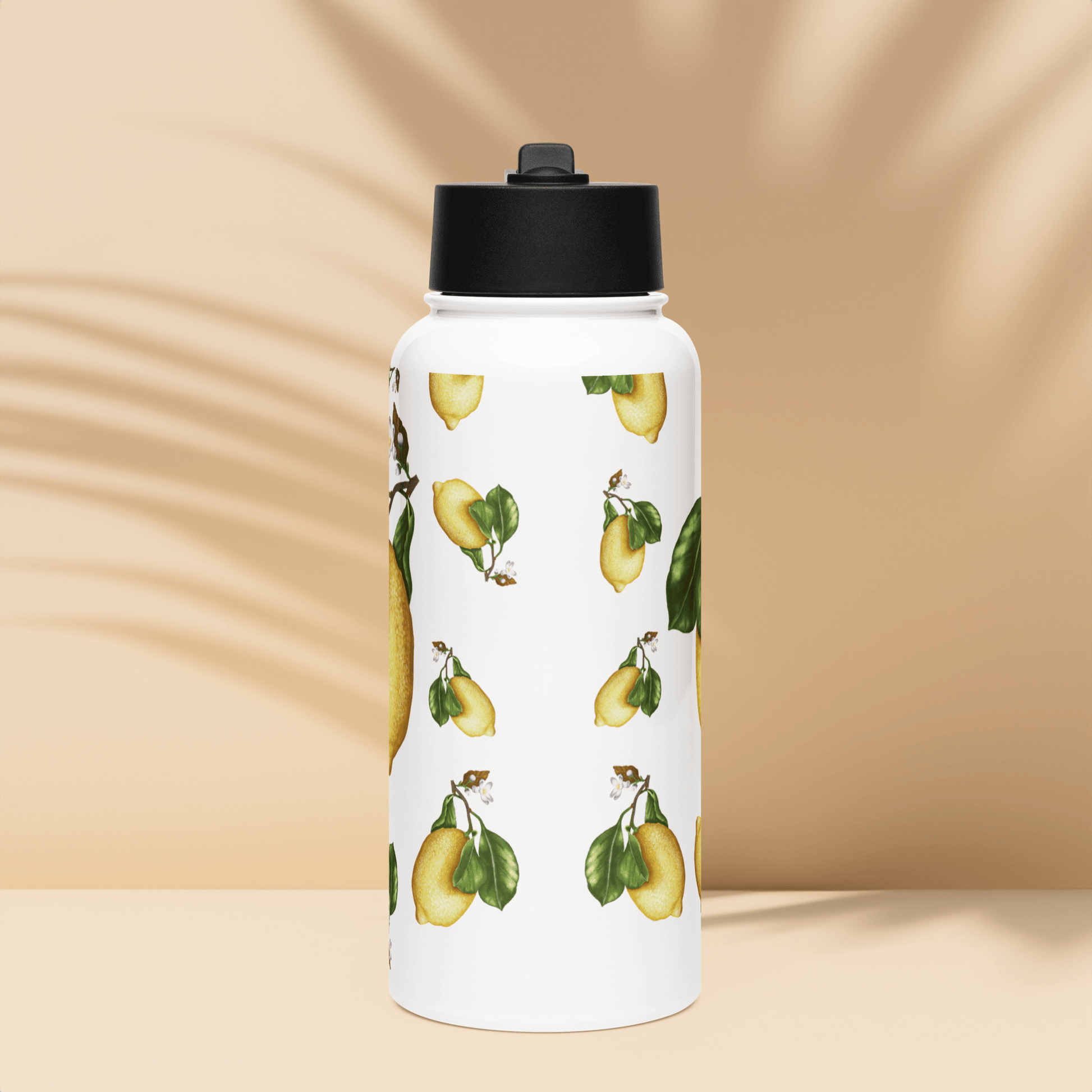 Personalized 32oz water bottle featuring vibrant lemon and leaf motifs, perfect summer gift for health enthusiasts.