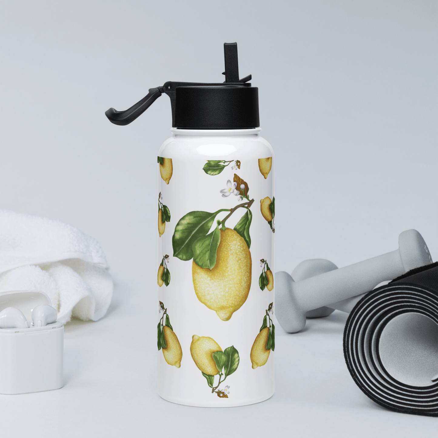 Zesty lemon water bottle featuring vibrant lemon slices and green leaves, perfect for summer fitness enthusiasts and stylish hydration.