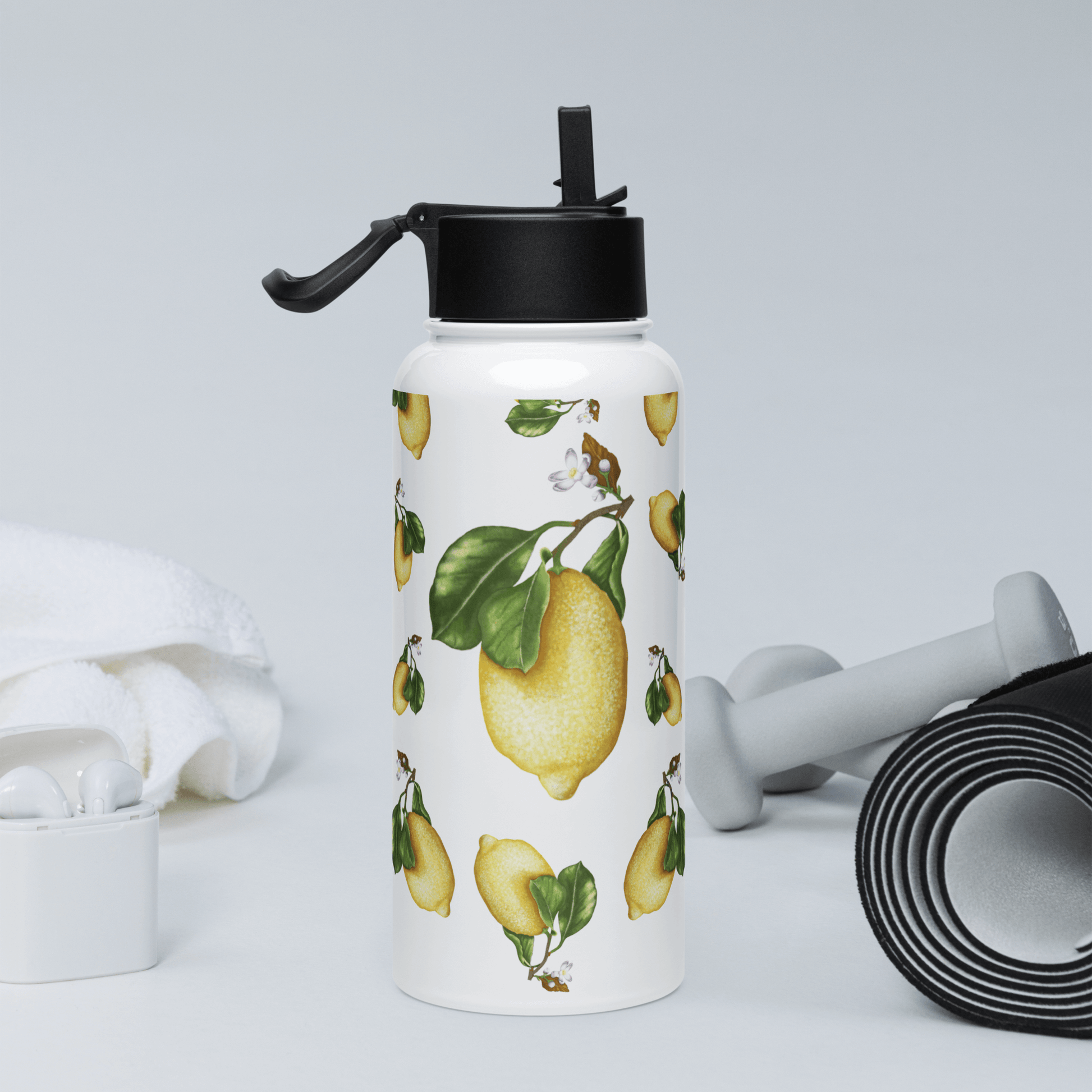 Zesty lemon water bottle featuring vibrant lemon slices and green leaves, perfect for summer fitness enthusiasts and stylish hydration.