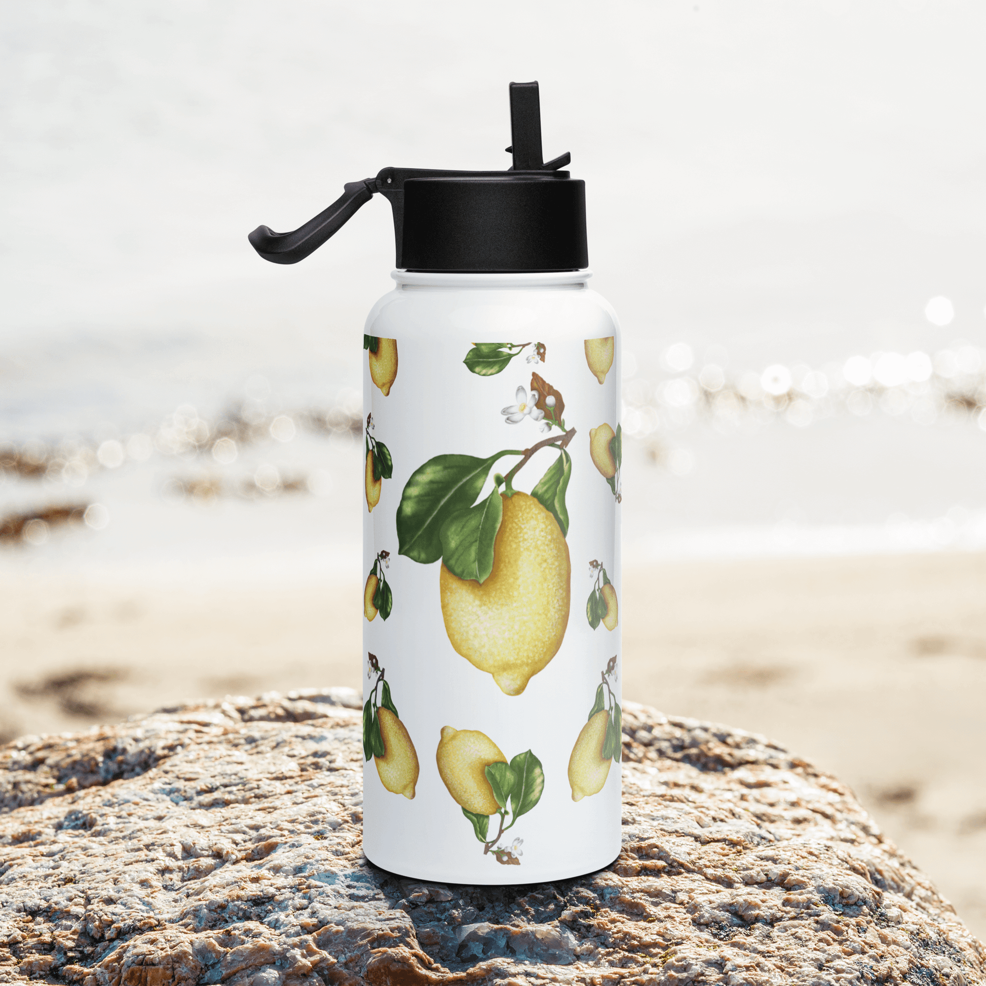 Zesty lemon water bottle with green leaves, perfect summer drinkware gift by the beach. Ideal for health enthusiasts.