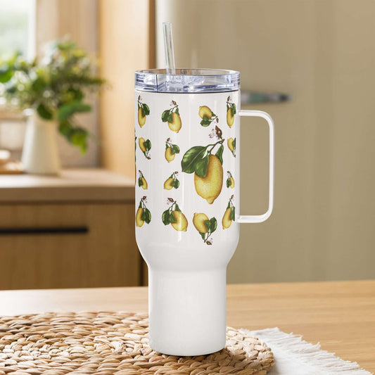 Lemon design tumbler with handle on a kitchen table, perfect for travel mugs and insulated water bottles.