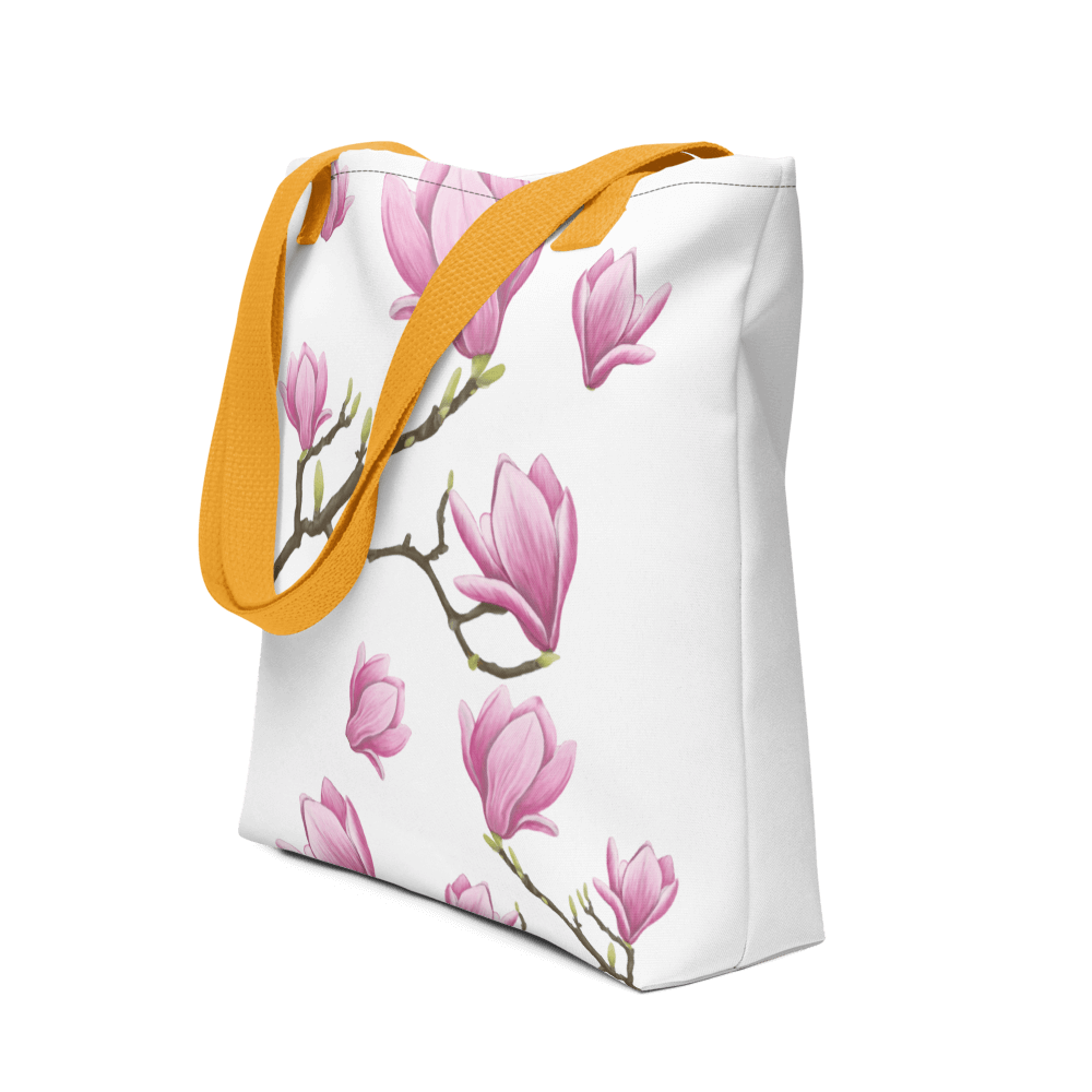 Magnolia all-over print tote bag - Focusing on the yellow handle
