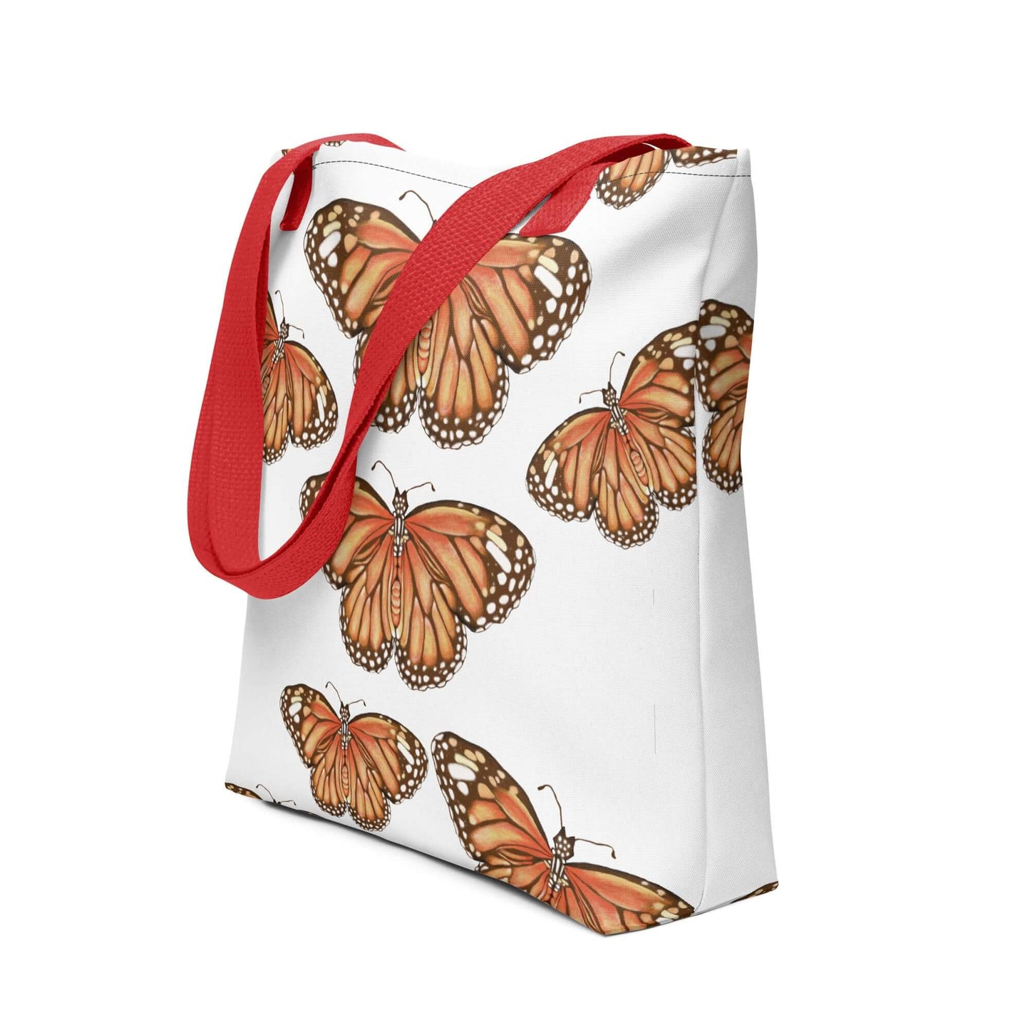 Butterfly Migration Canvas Tote Bag with vibrant monarch butterflies and red straps, perfect for nature lovers and gifts.