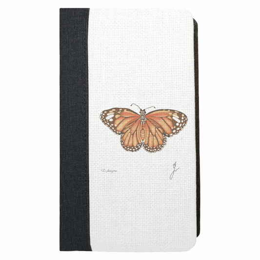 Monarch butterfly drawn on a notebook close