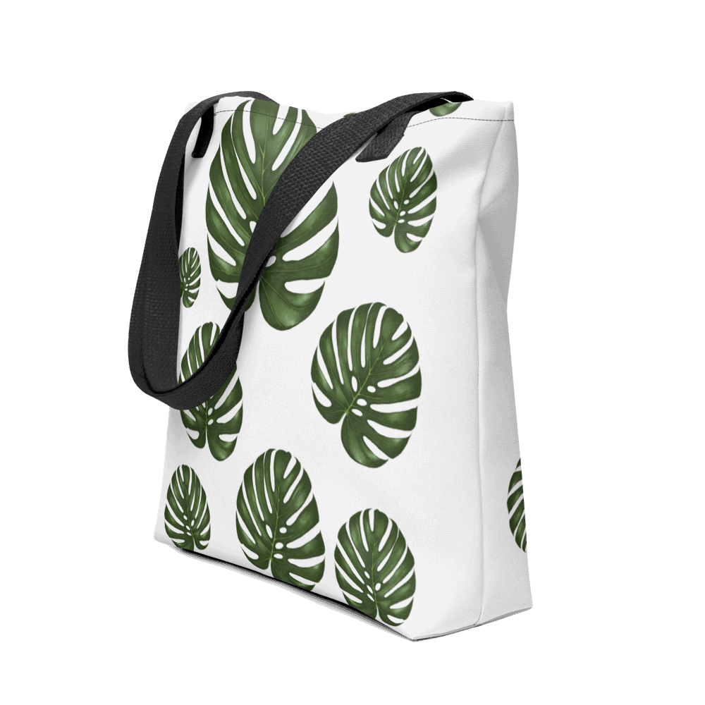 Monstera all-over print tote bag with black handles image showing the full design