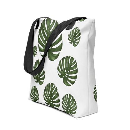 Monstera all-over print tote bag with black handles image showing the full design