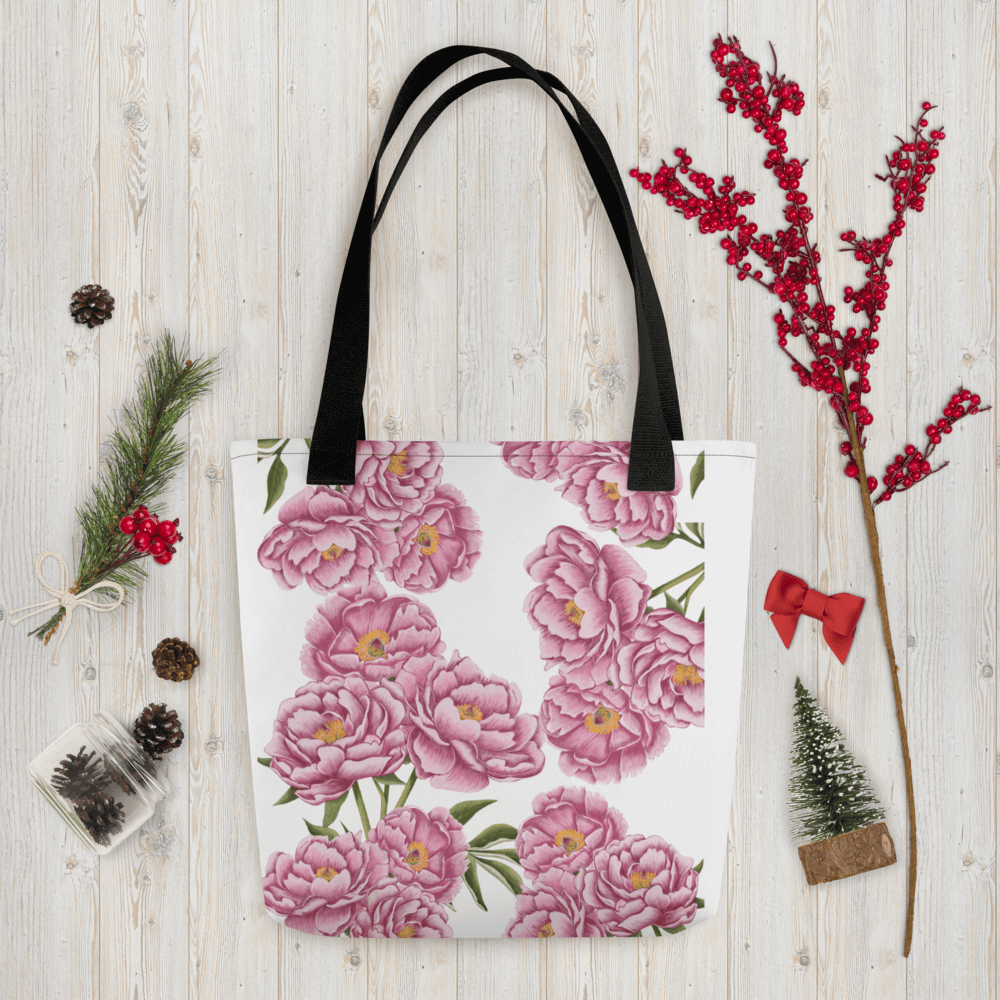 Peony all-over print tote bag with black handles within Christmas decorations like red berry little branch