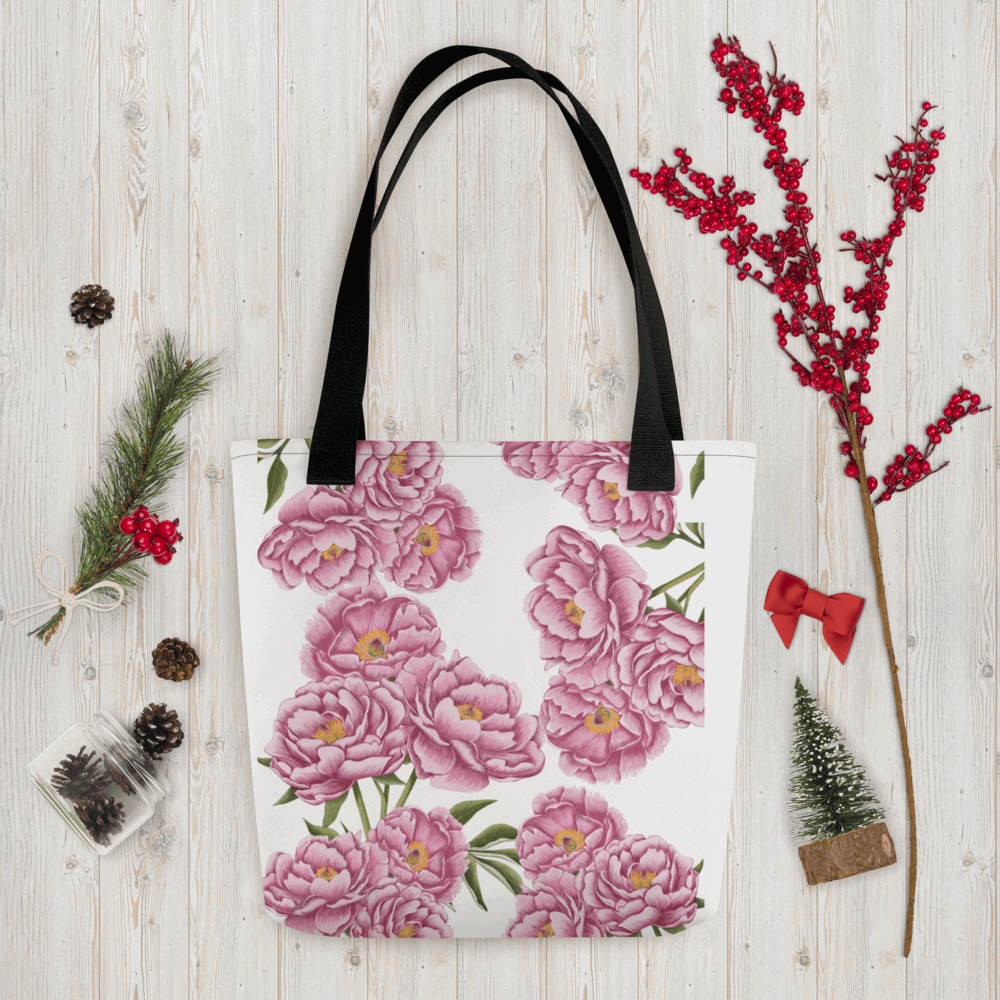 Peony all-over print tote bag with black handles within Christmas decorations like red berry little branch