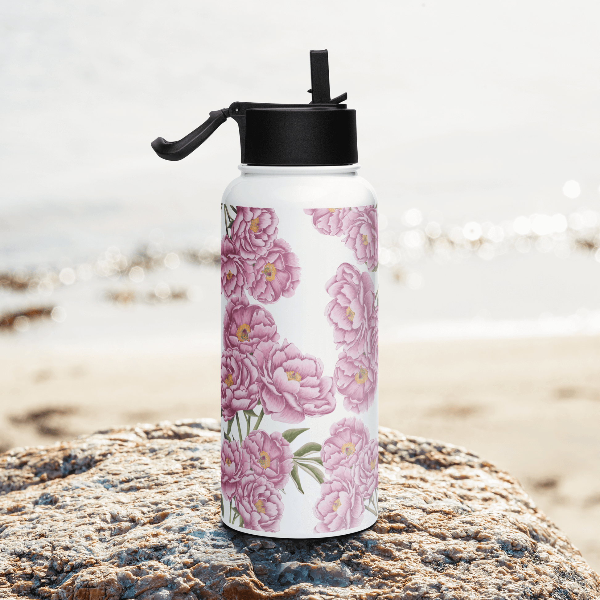 Romantic peony water bottle in a serene beach setting, perfect for gifts, travel, and hydration.