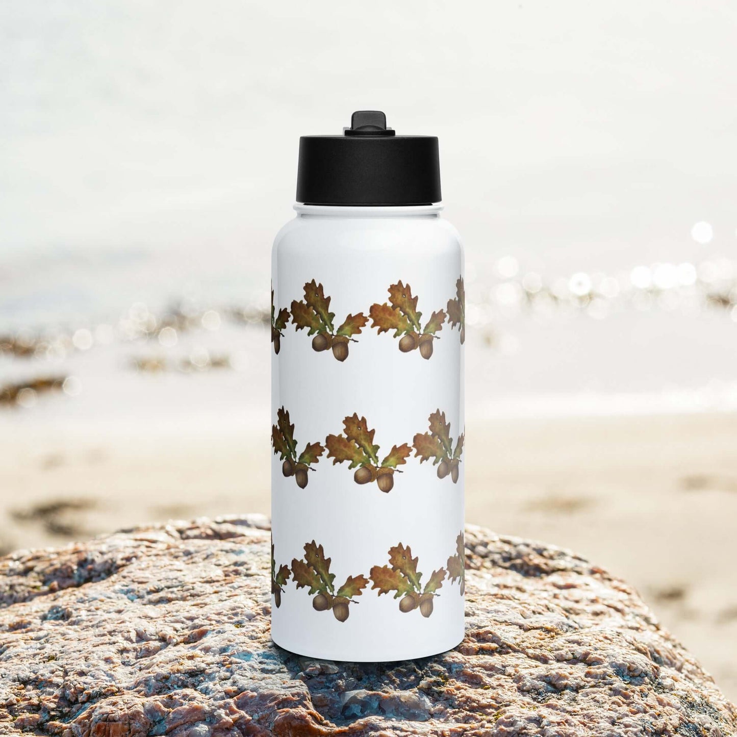 Insulated stainless steel tumbler with oak leaf design, perfect for travel, gifts, and outdoor activities.