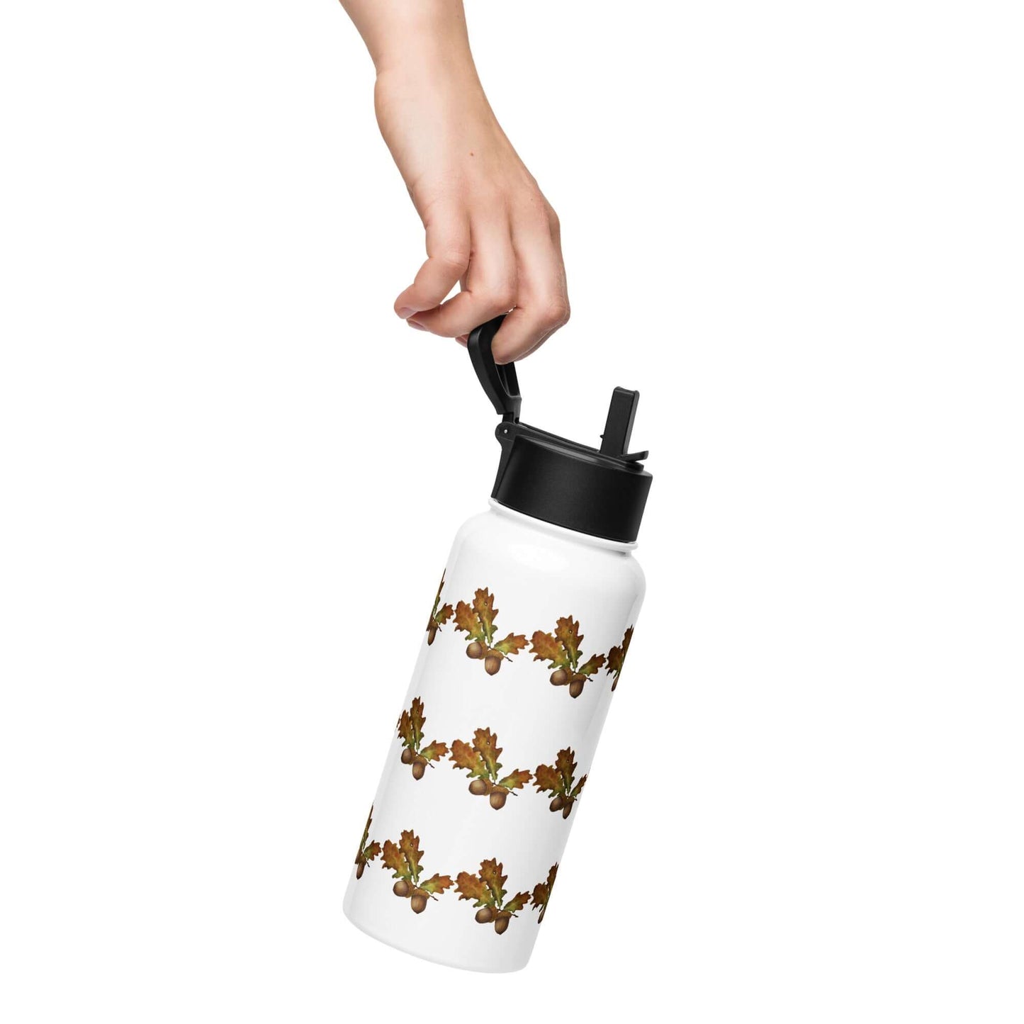 Hand holding an oak leaf patterned insulated tumbler with straw lid, ideal for gifts and outdoor activities.