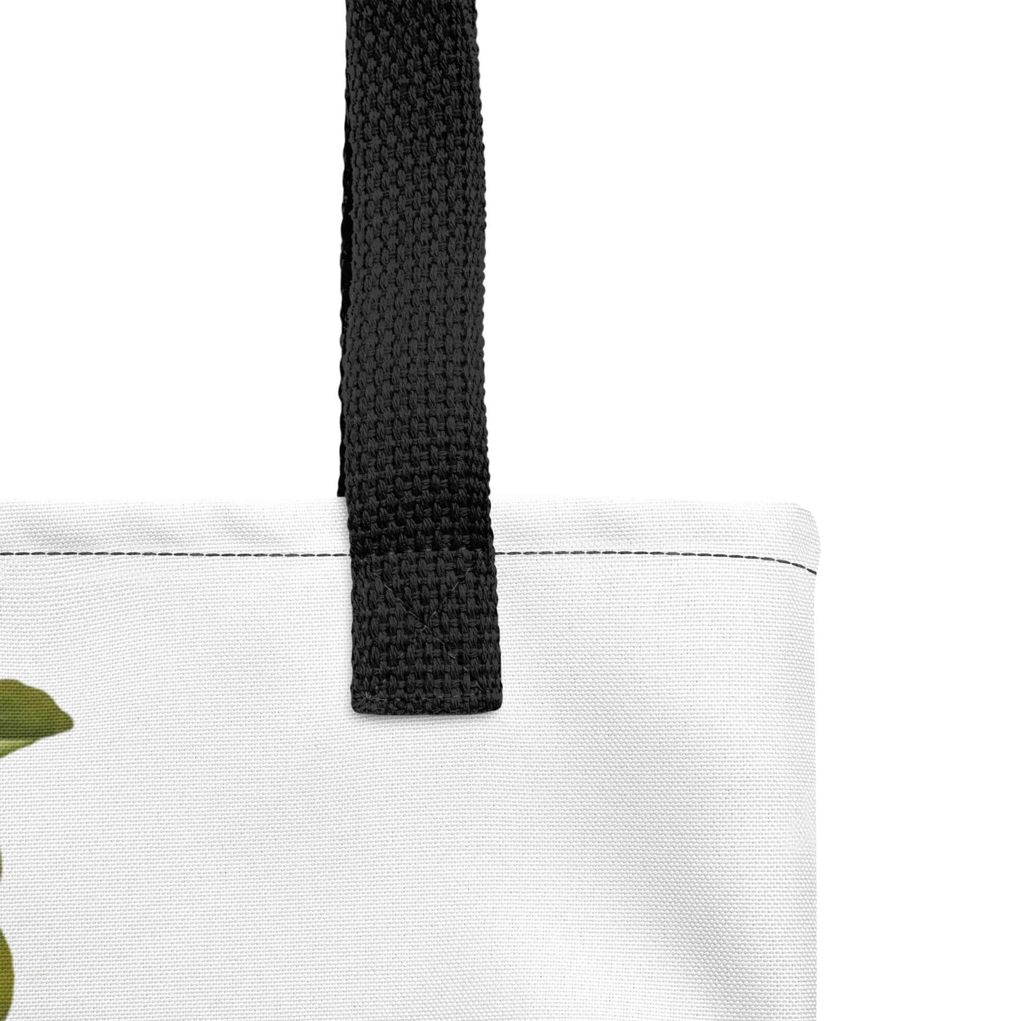 Close-up of the black handle and top edge of a large sunflower botanical tote bag, showcasing its quality and design.