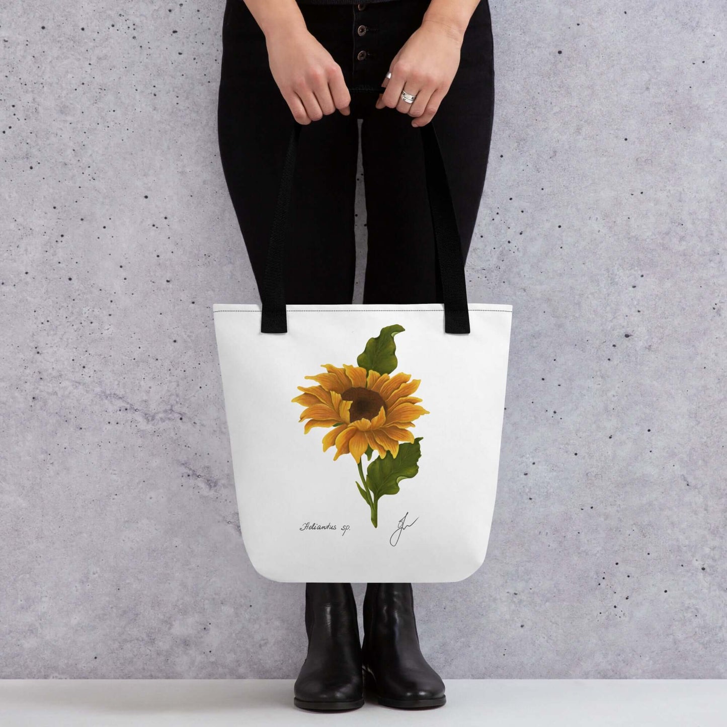 Large sunflower botanical tote bag held by a person, ideal as a gift for any occasion. Perfect for style and functionality.