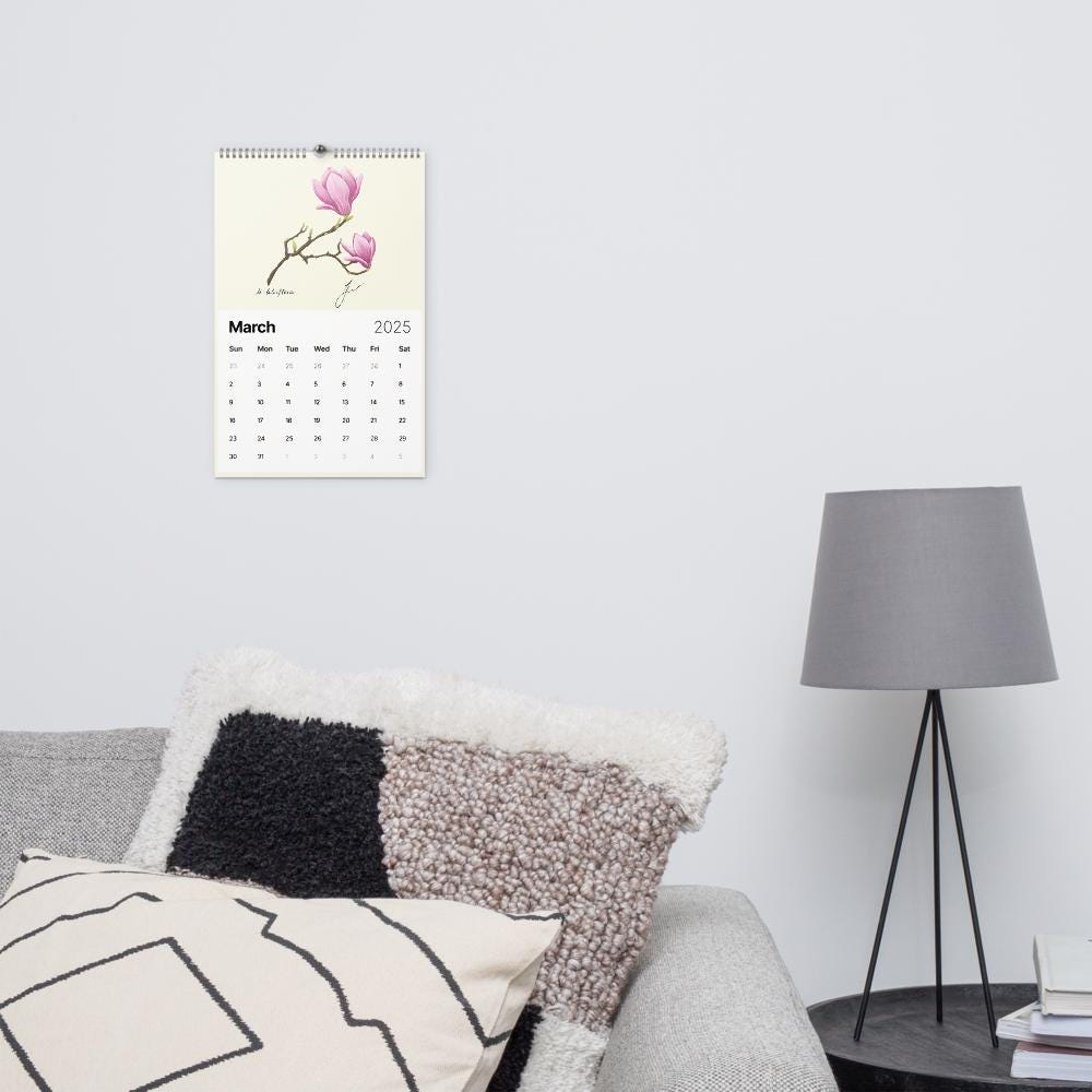 Wall Calendar 2025 - hand drawn magnolia for March 2025 - cottagecore style - calendar hanging in a living room